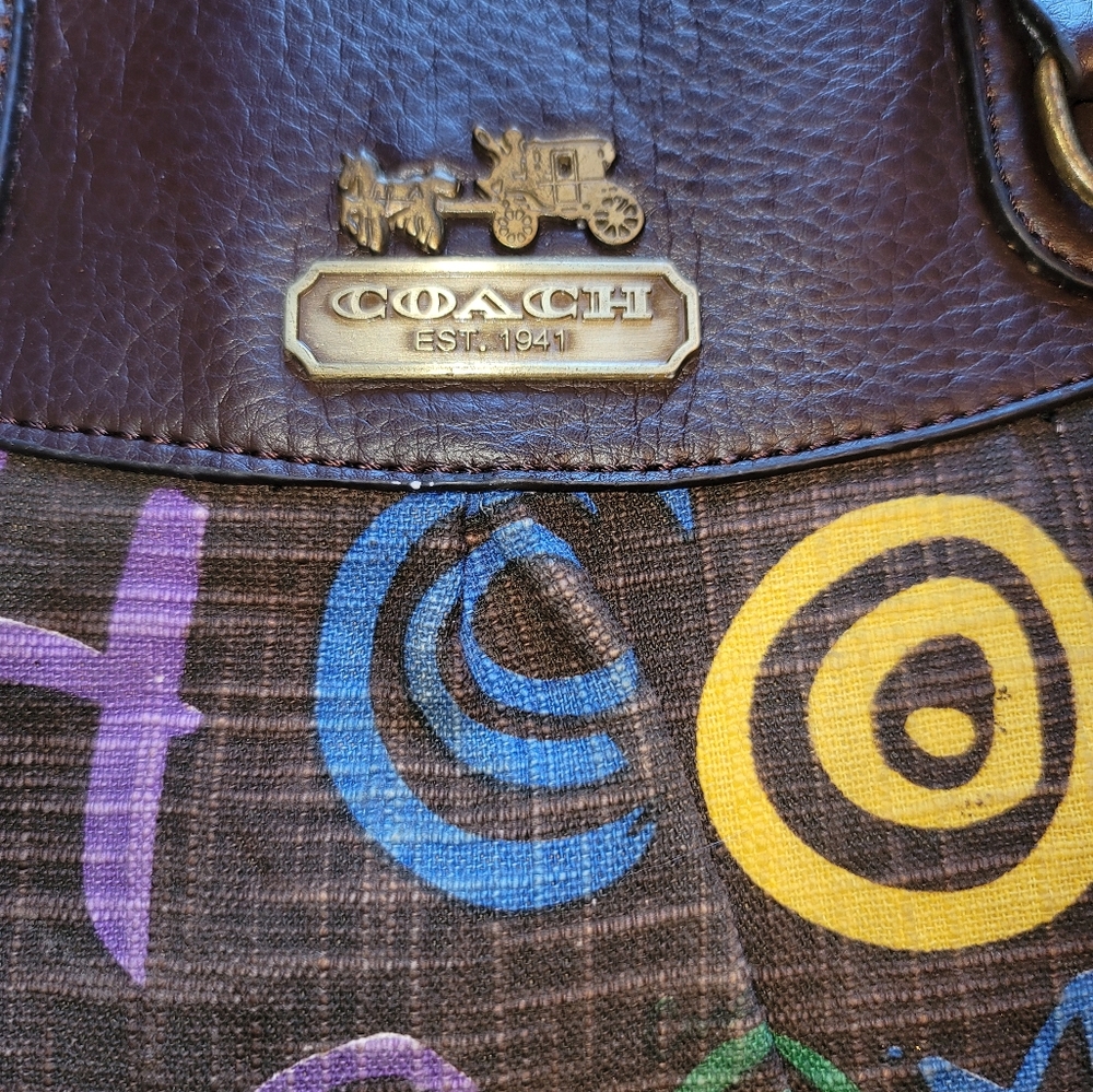 Coach multi color hand bag used